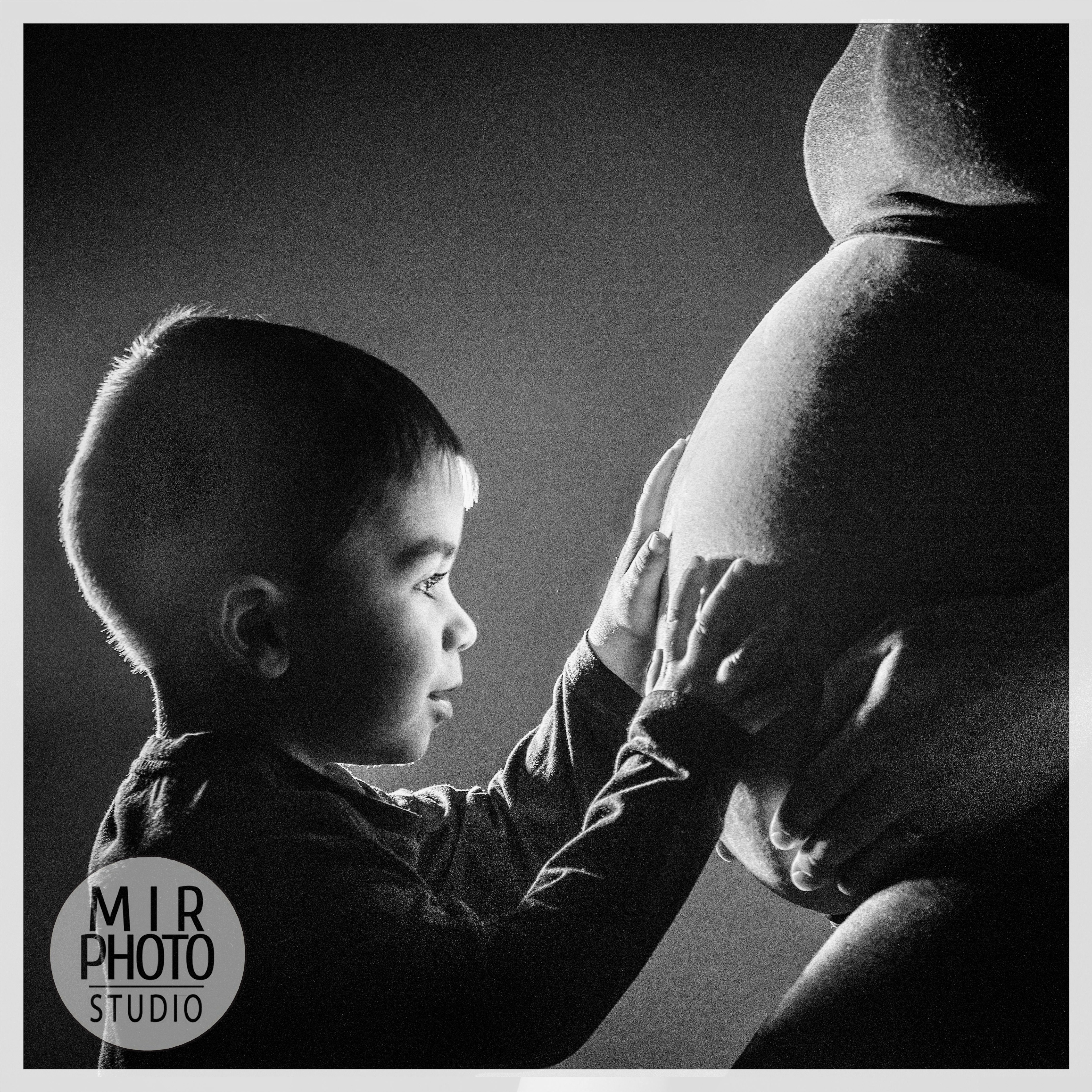 Séance photo femme enceinte en famille