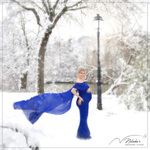 Shooting future maman sous la neige de Paris